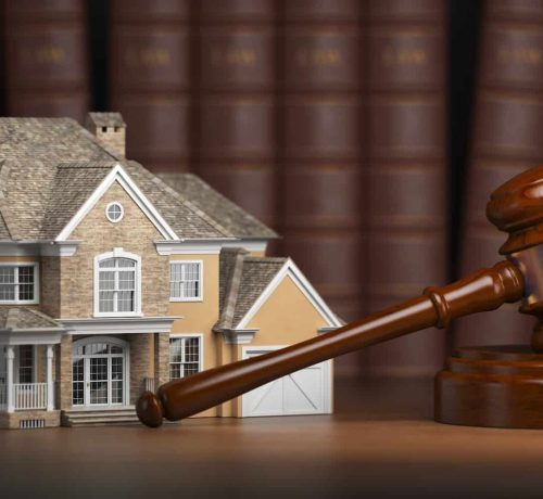 house-with-gavel-and-law-books-real-estate-law-and-house-aucti